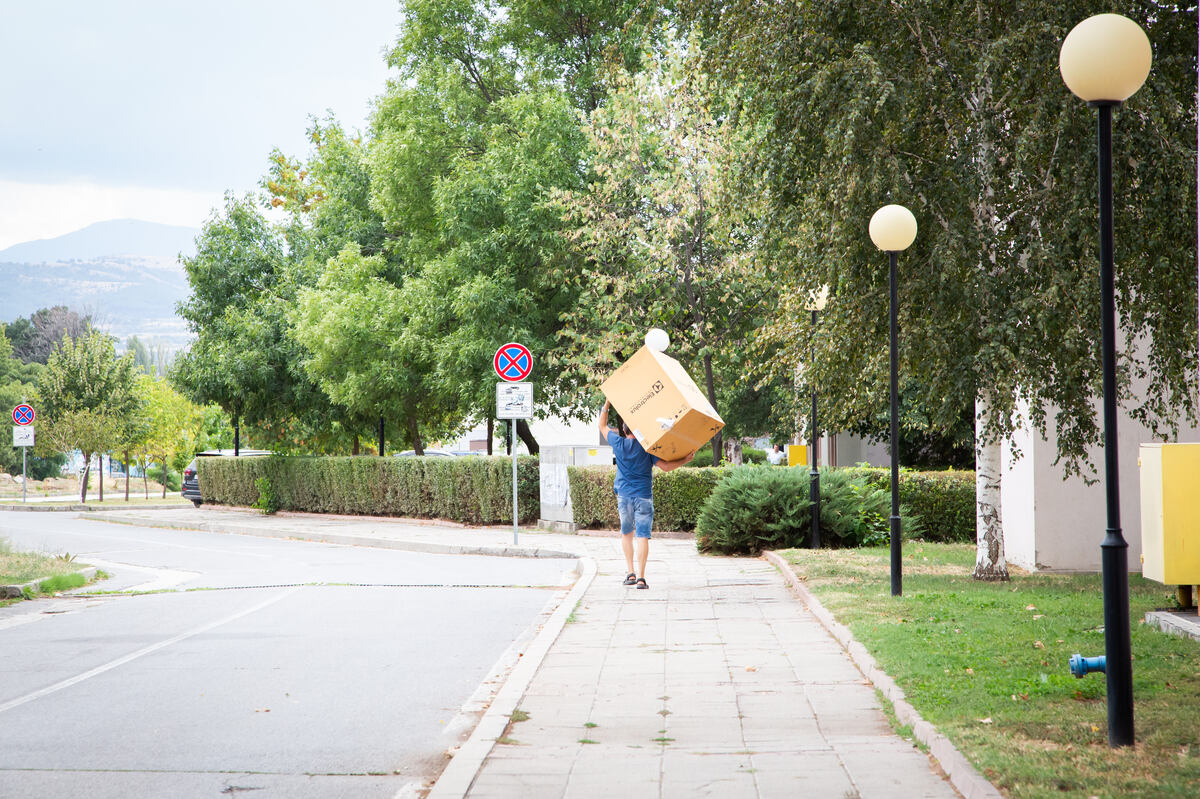 A student packing for university to prepare for a successful new semester at university