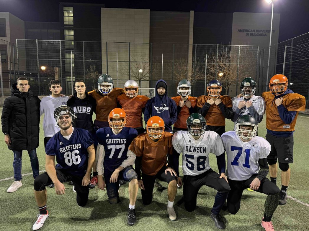 AUBG student Ben Whyman posing with the Griffins team on campus