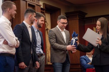 Team Dividend Detectives—Aleksandar Zemlyakov, Erlis Kazmaj, Klaudio Lushka, and Elio Pujo; CFA